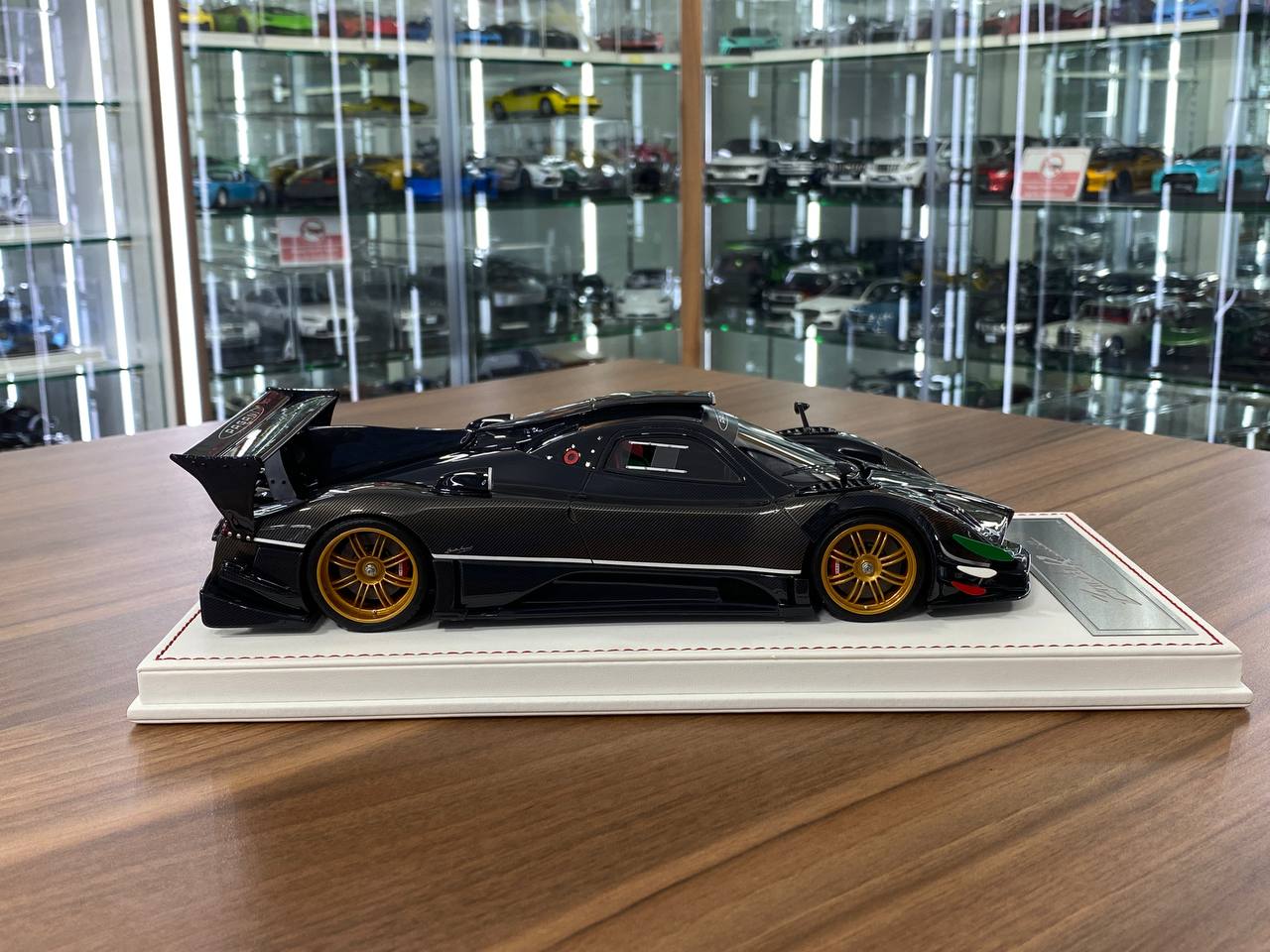 1/18 Resin Pagani Zonda Revolucian – Dino Models Carbon Fiber Grey with Gold Rims Limited 30 pcs