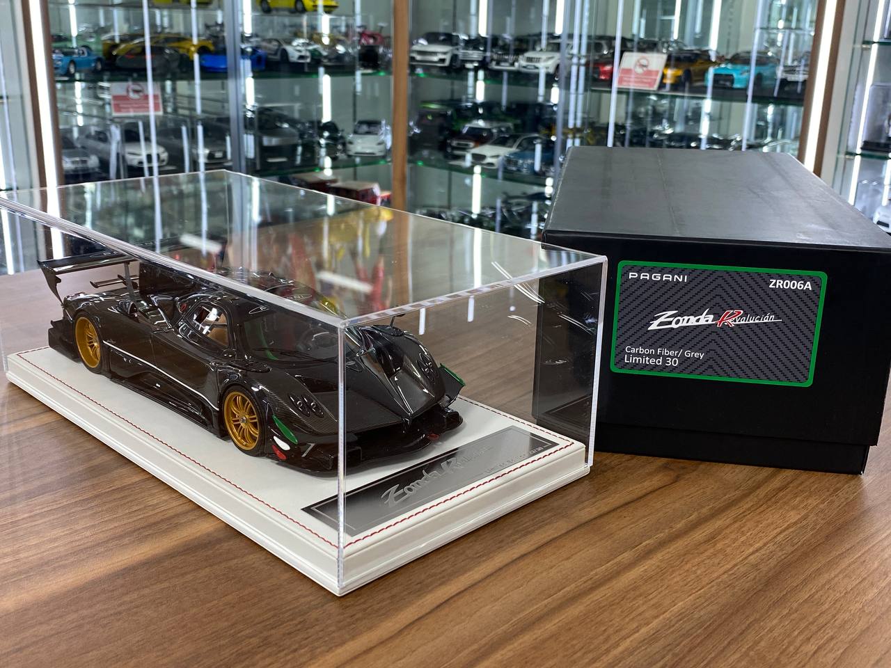 1/18 Resin Pagani Zonda Revolucian – Dino Models Carbon Fiber Grey with Gold Rims Limited 30 pcs