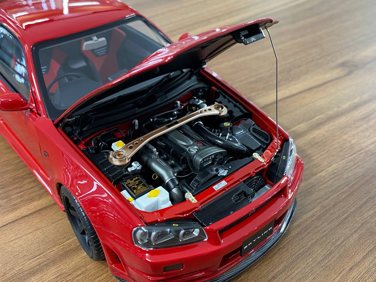 1/18 Diecast – Nissan Skyline GT-R R34 Customized Version | MotorHelix | Limited 399 pcs | Active Red