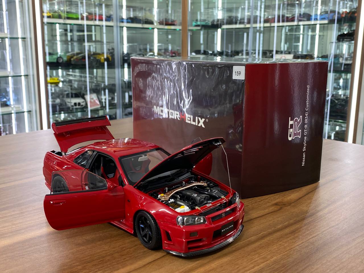 1/18 Diecast – Nissan Skyline GT-R R34 Customized Version | MotorHelix | Limited 399 pcs | Active Red