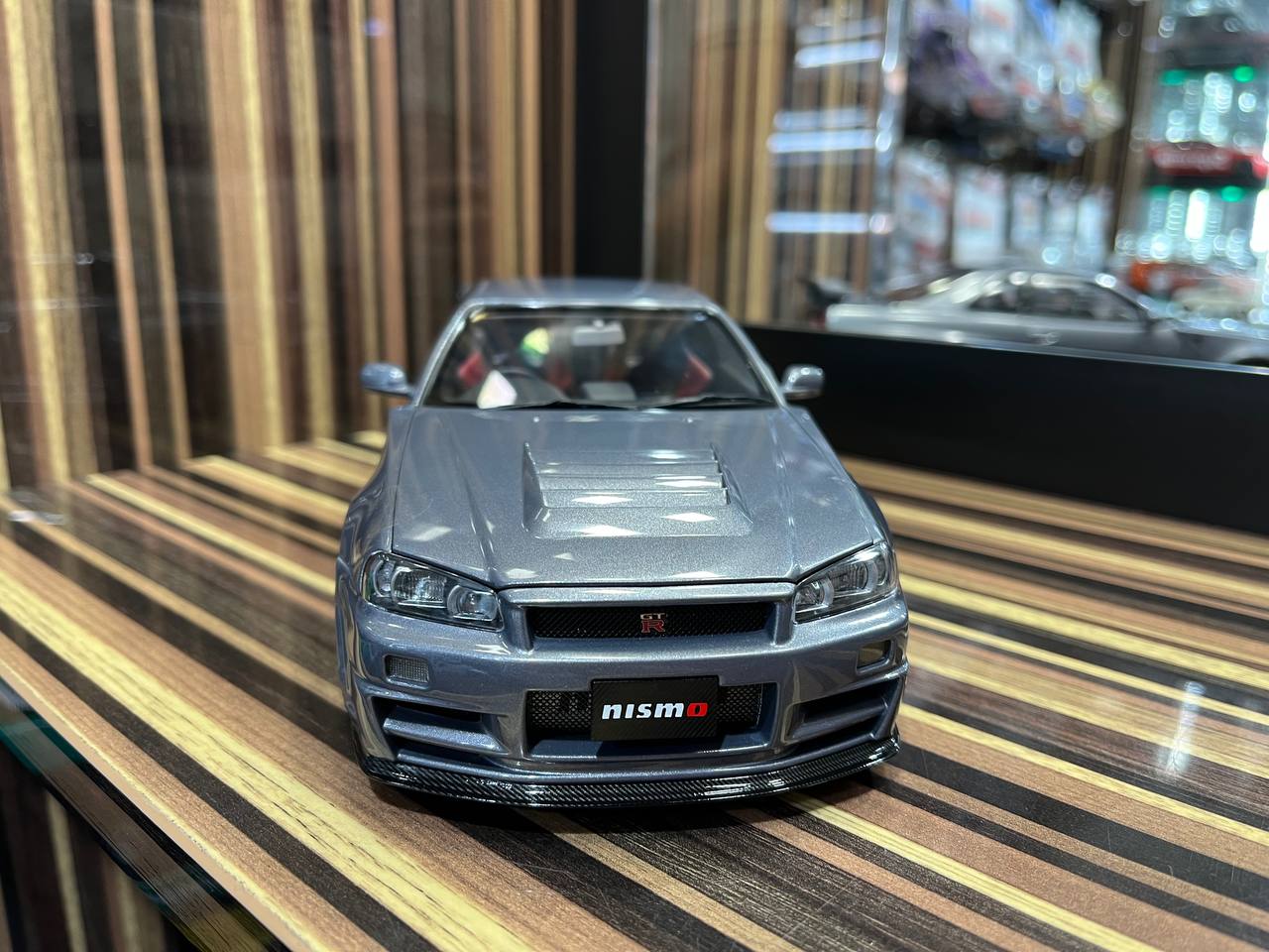 MotorHelix Nissan Skyline GT-R34 Nismo - 1/18 Diecast Model, Full Opening - Gun Metallic