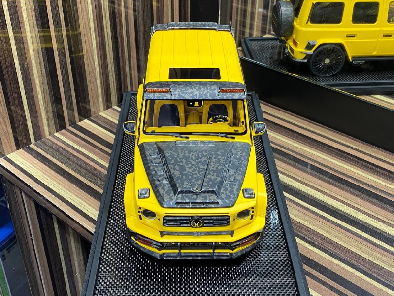 Mercedes-Benz G63 MANSORY Yellow Motorhelix|Sold in Dturman.com Dubai UAE.