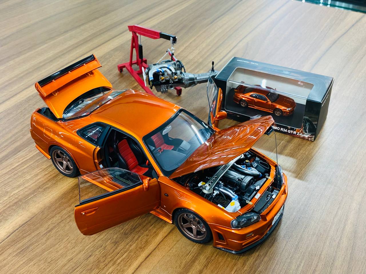 MotorHelix Nissan Skyline GT-R R34 Z-Tune Nismo - 1/18 Diecast , Metallic Orange, Limited to 599 Units