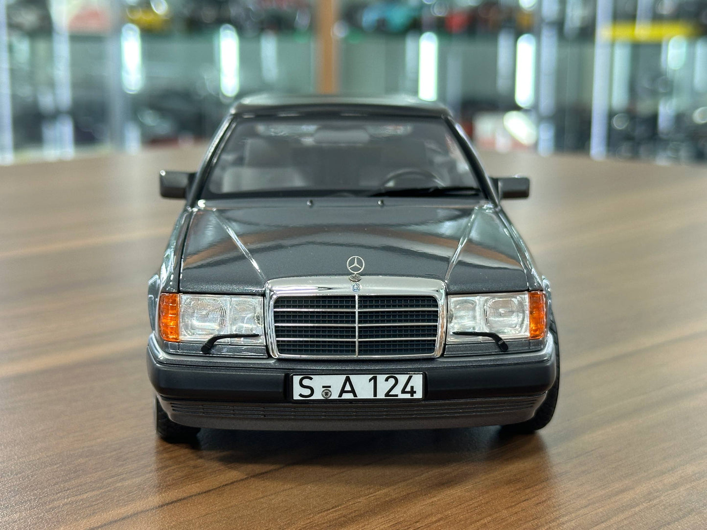 1/18 Diecast Mercedes-Benz 300 CE-24 Cabriolet (W124, 1991–1993) – Norev Dealer Edition (Pearl Grey)