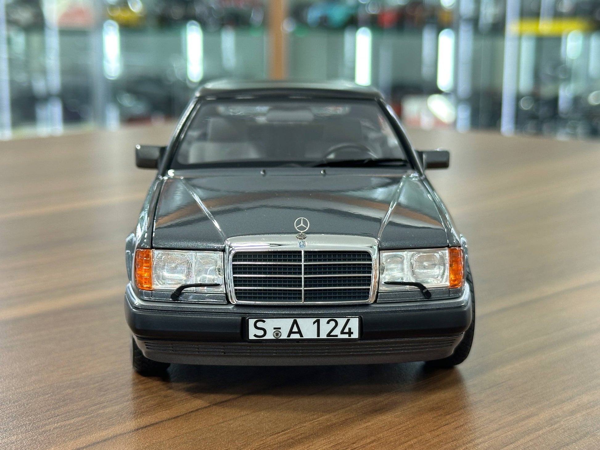 1/18 Diecast Mercedes-Benz 300 CE-24 Cabriolet (W124, 1991–1993) – Norev Dealer Edition (Pearl Grey)