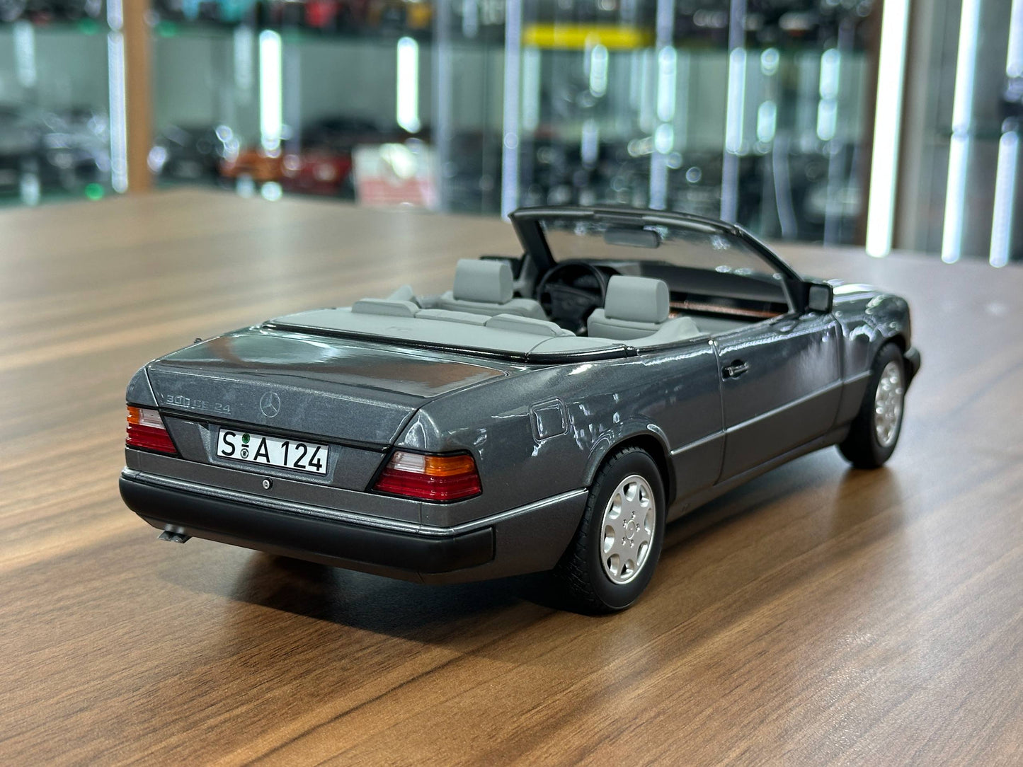 1/18 Diecast Mercedes-Benz 300 CE-24 Cabriolet (W124, 1991–1993) – Norev Dealer Edition (Pearl Grey)