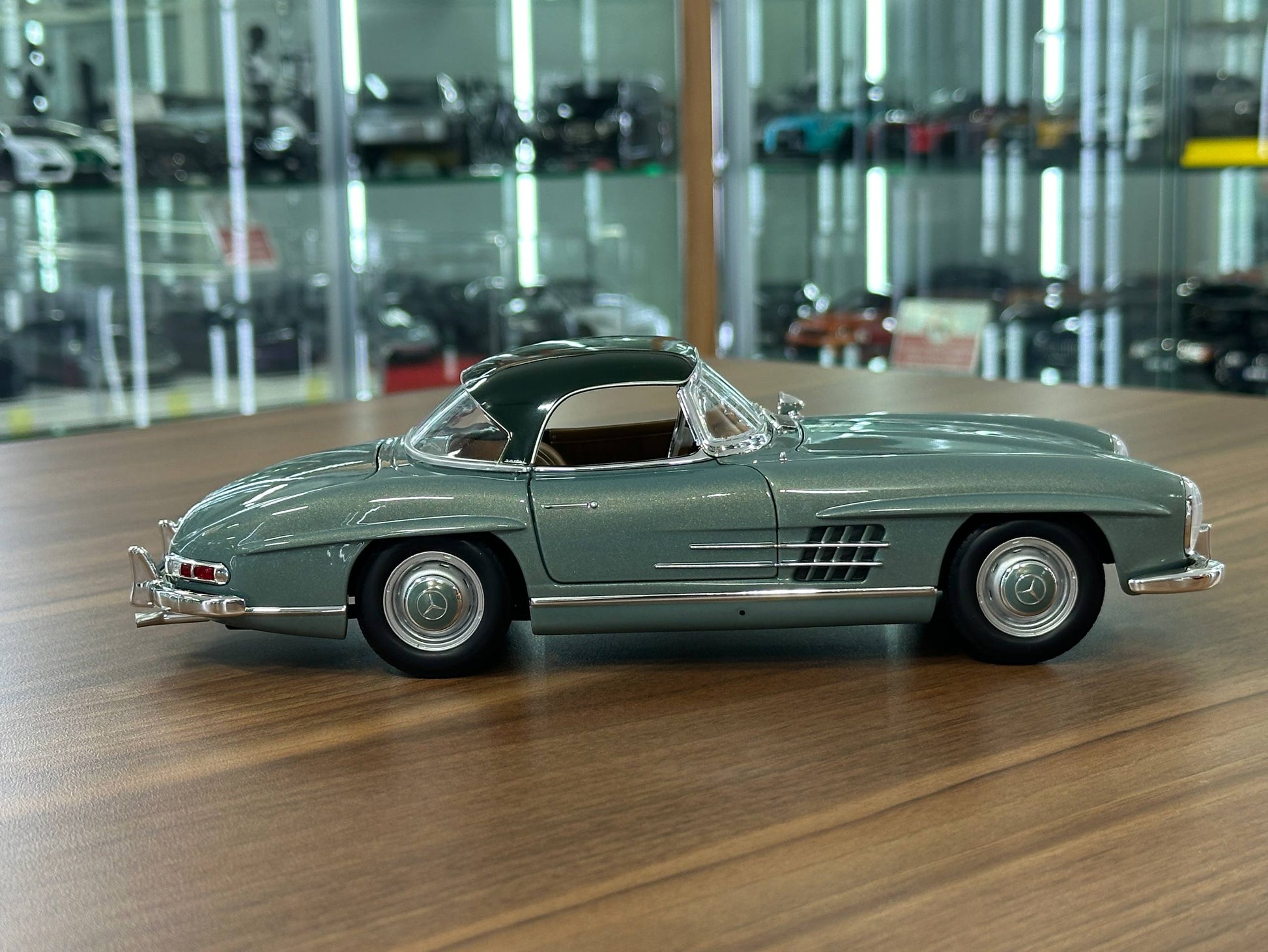 1/18 Diecast Mercedes-Benz 300 SL Roadster (W198, 1957–1963) – Norev Dealer Edition (Light Green)