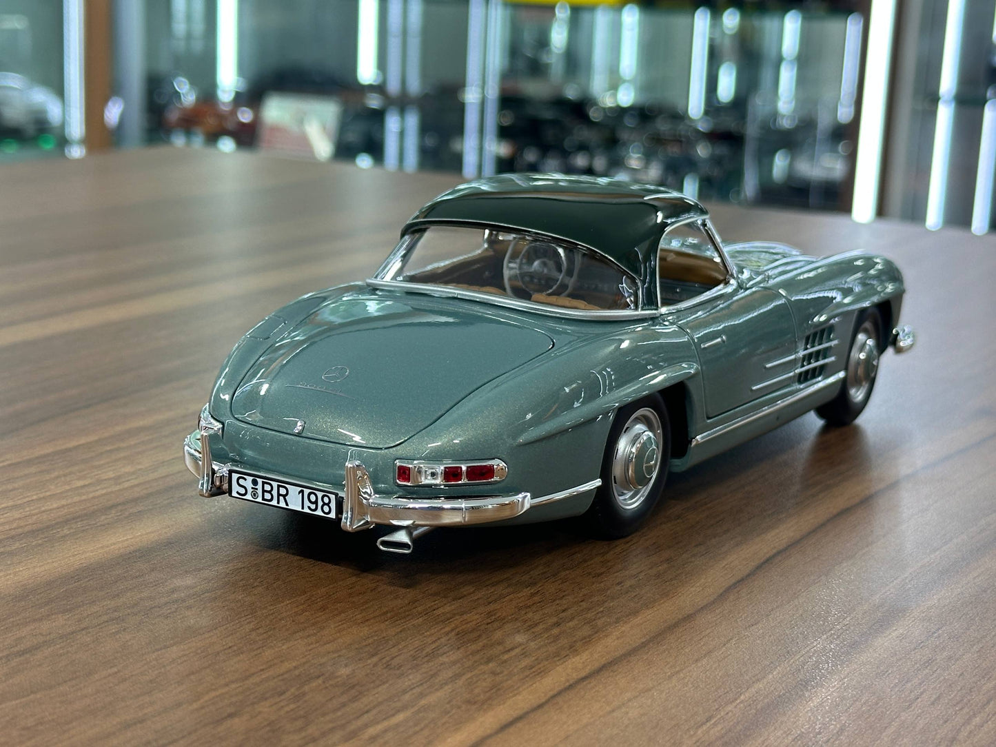 1/18 Diecast Mercedes-Benz 300 SL Roadster (W198, 1957–1963) – Norev Dealer Edition (Light Green)
