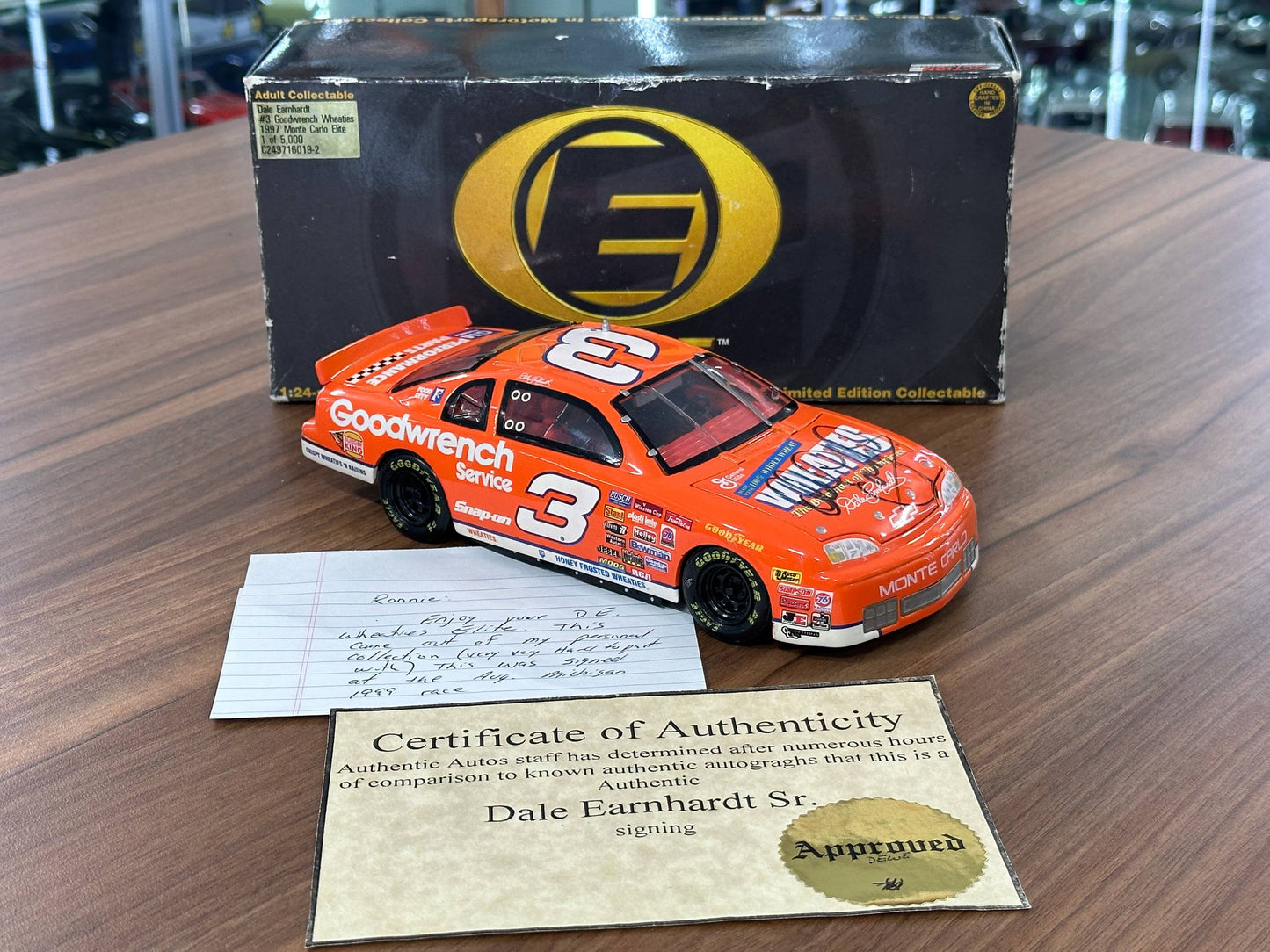 Action Racing Collectables NASCAR Chevrolet Monte Carlo Elite 1997 – Dale Earnhardt #3 Goodwrench Wheaties Orange – 1:24 Diecast Model (Full Opening, Limited Edition)