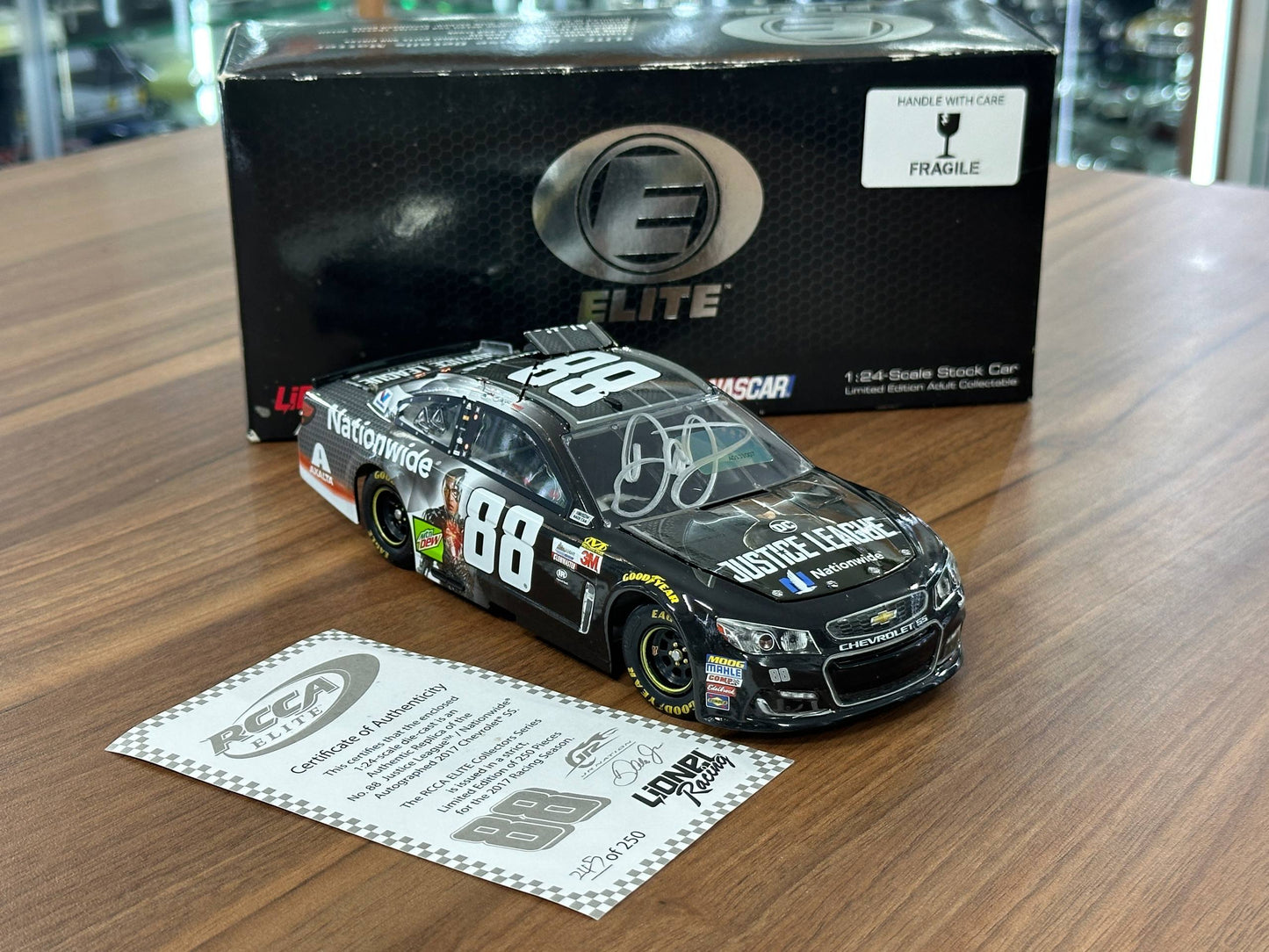 Action Racing Collectables NASCAR Chevrolet SS 2017 – Dale Earnhardt Jr #88 Nationwide Justice League – Silver – 1:24 Diecast Model (Full Opening, Limited Edition)