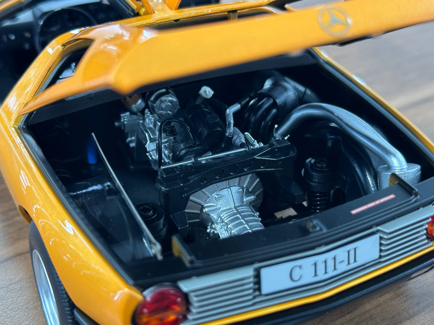 1/18 Diecast Mercedes-Benz C111-II (1970) – Norev Dealer Edition (Weissherbst Orange)