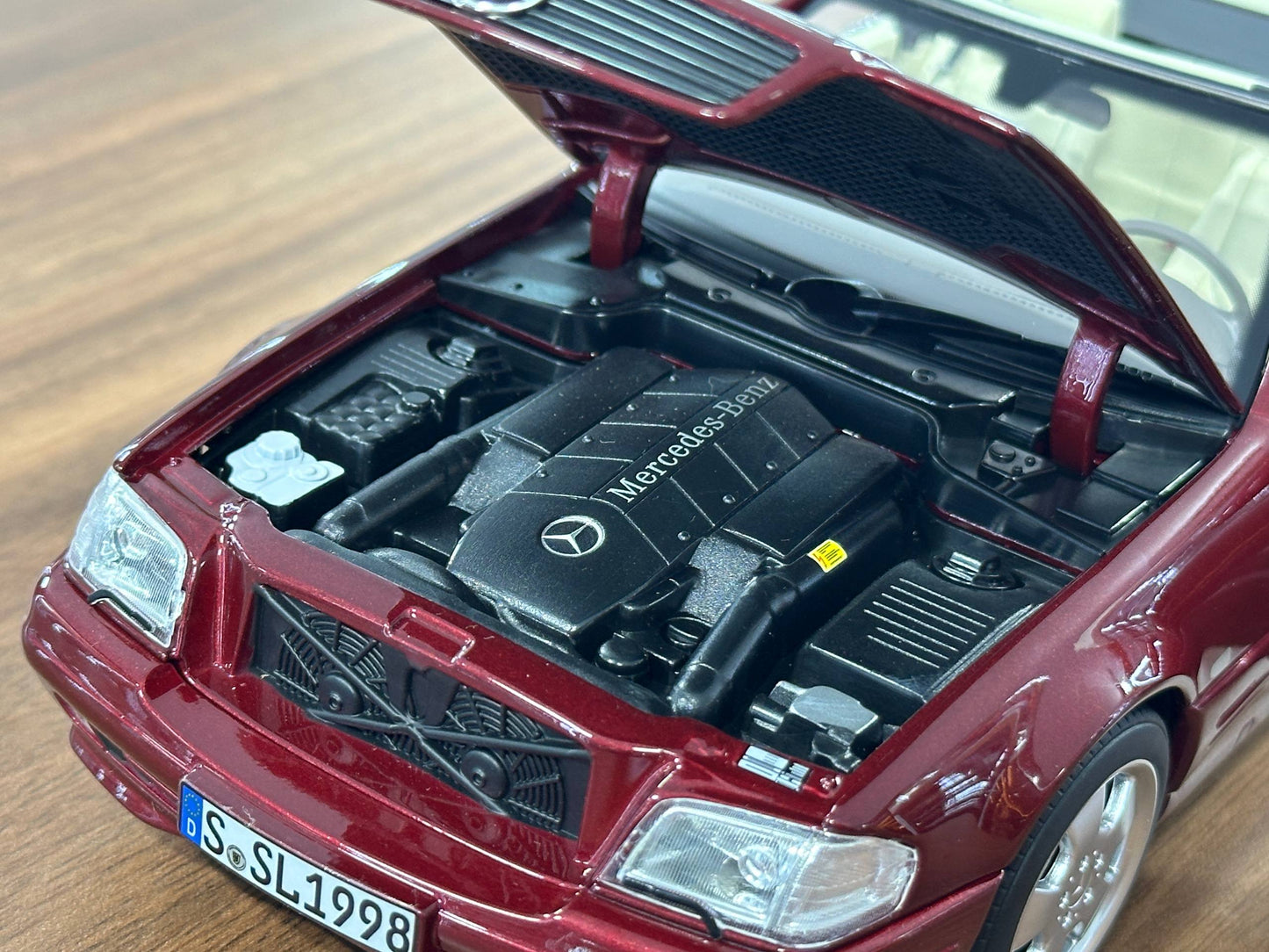 1/18 Diecast Mercedes-Benz SL 500 (R129, 1998–2001) – Norev Dealer Edition (Amber Red)