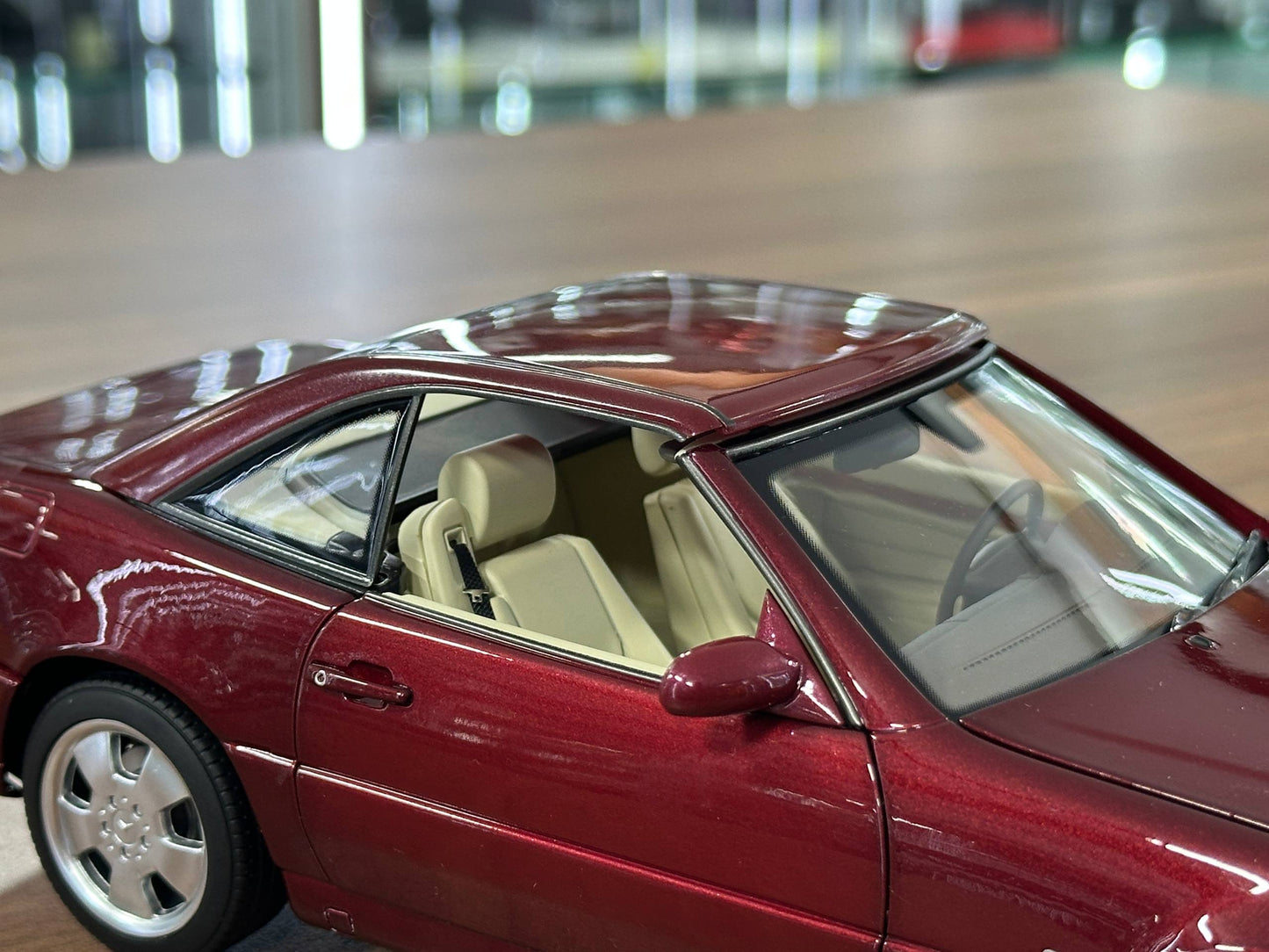1/18 Diecast Mercedes-Benz SL 500 (R129, 1998–2001) – Norev Dealer Edition (Amber Red)