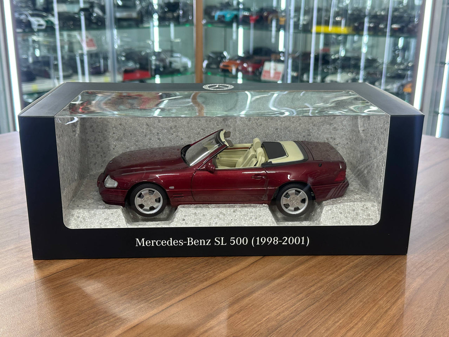 1/18 Diecast Mercedes-Benz SL 500 (R129, 1998–2001) – Norev Dealer Edition (Amber Red)