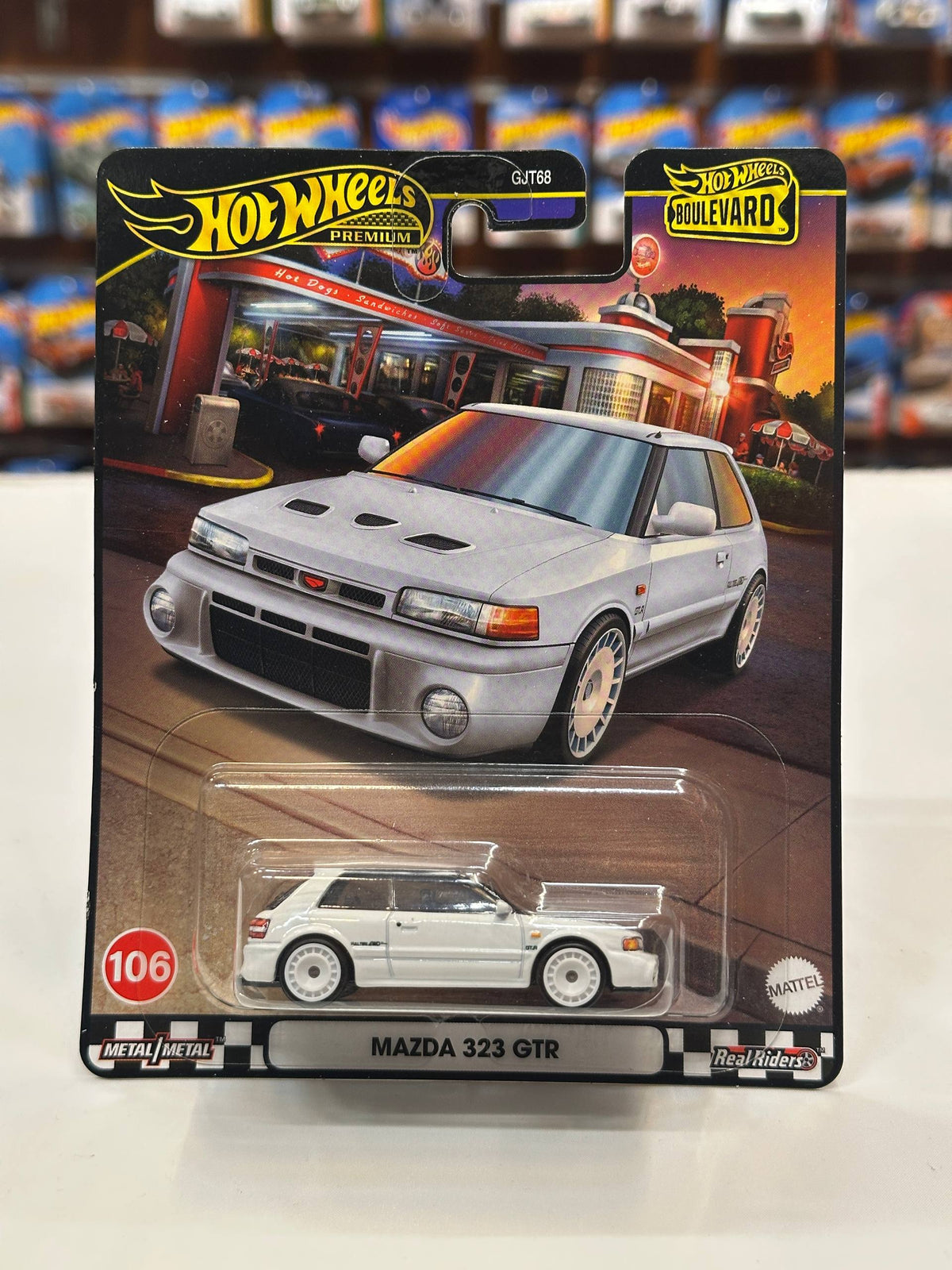 1/64 Diecast HotWheels Mazda 323 GTR