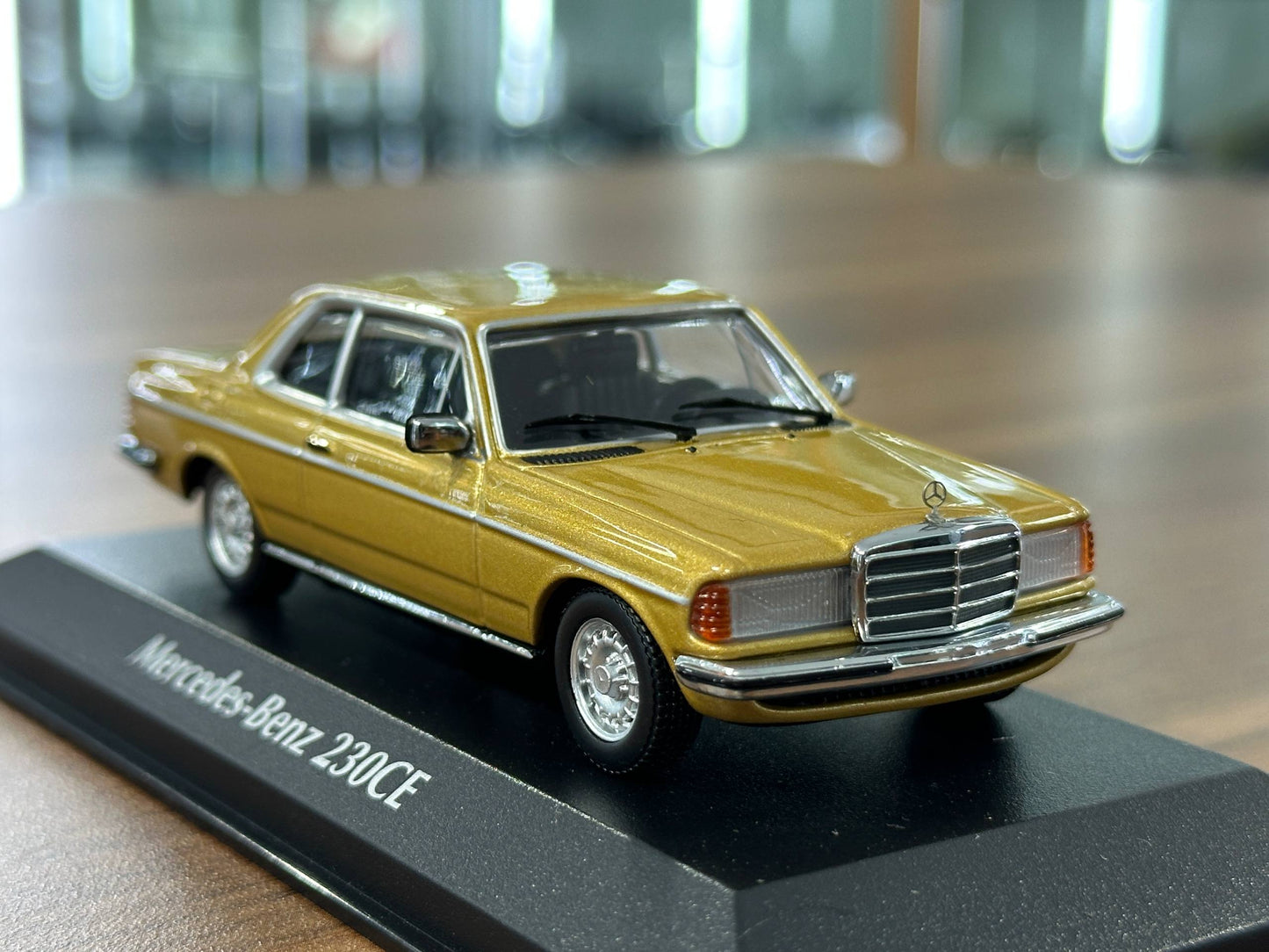 1/43 Diecast Mercedes Benz 230 CE 1976 in Gold Metallic (Maxichamps)