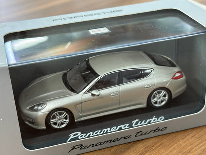 Minichamps Porsche Panamera Turbo – Gold – 1:43 Diecast Model