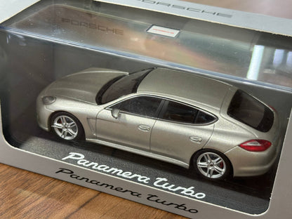 Minichamps Porsche Panamera Turbo – Gold – 1:43 Diecast Model