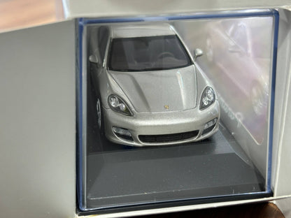 Minichamps Porsche Panamera Turbo – Gold – 1:43 Diecast Model