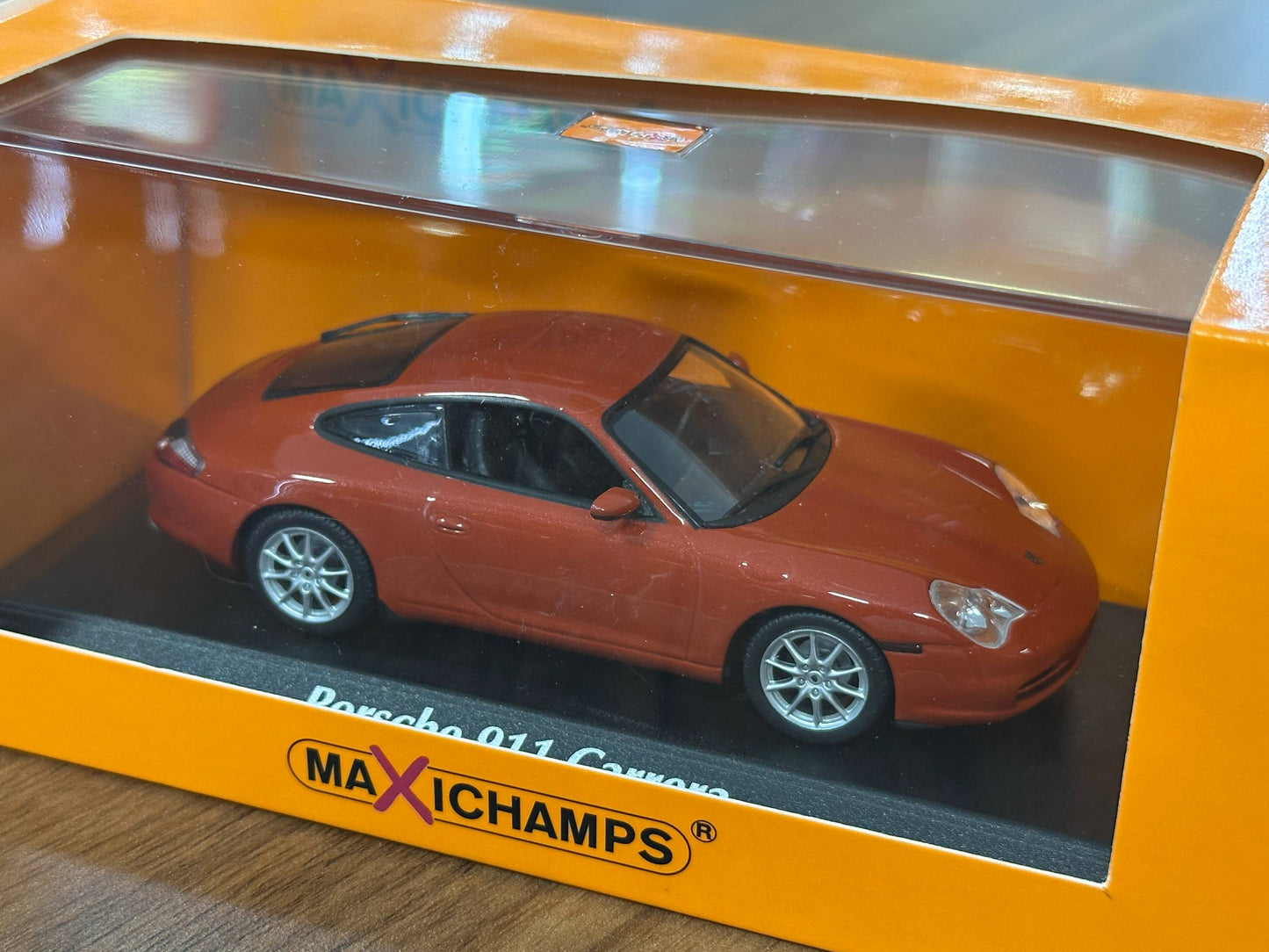 1/43 Diecast Maxichamps Porsche 911 Carrera 2001 in Orange Red Metallic
