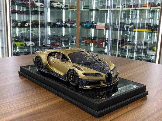 Timothy & Pierre Bugatti Chiron Centuria MANSORY 1:18 resin model in Champagne Gold – limited edition for Dubai collectors