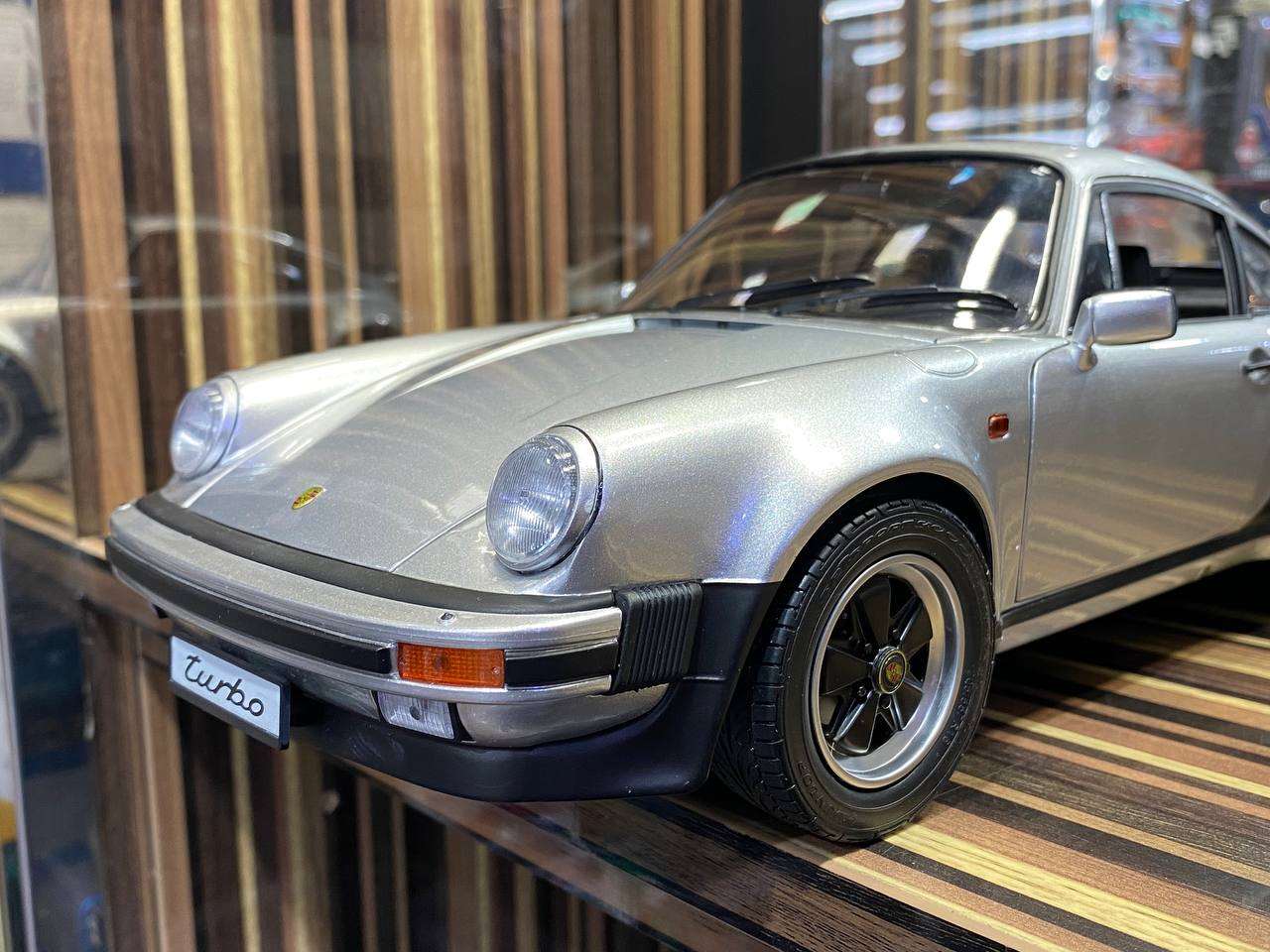 1/12 Schuco Metal Diecast - Porsche Turbo 930 in Timeless Silver with Full Opening|Sold in Dturman.com Dubai UAE.