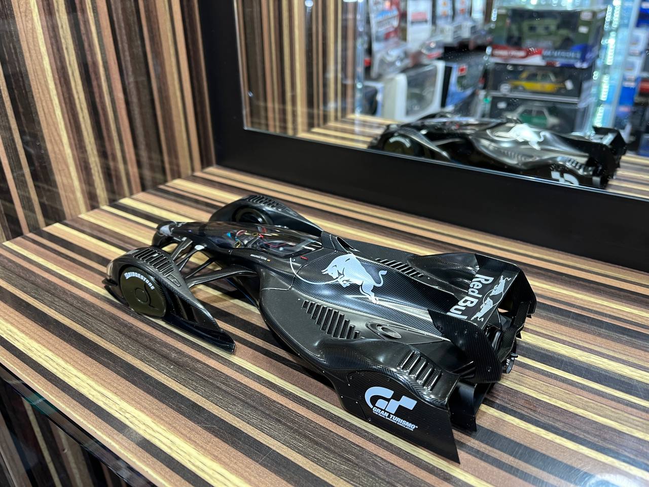 AutoArt Grand Turismo Red Bull X2010 - 1/18 Diecast Model, All Opening - Black