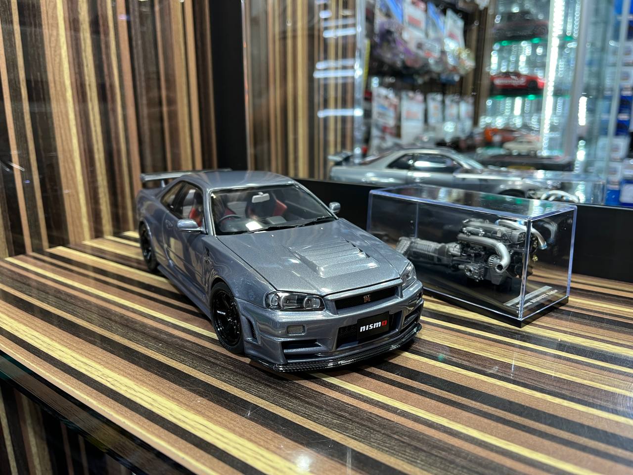 MotorHelix Nissan Skyline GT-R34 Nismo - 1/18 Diecast Model, Full Opening - Gun Metallic