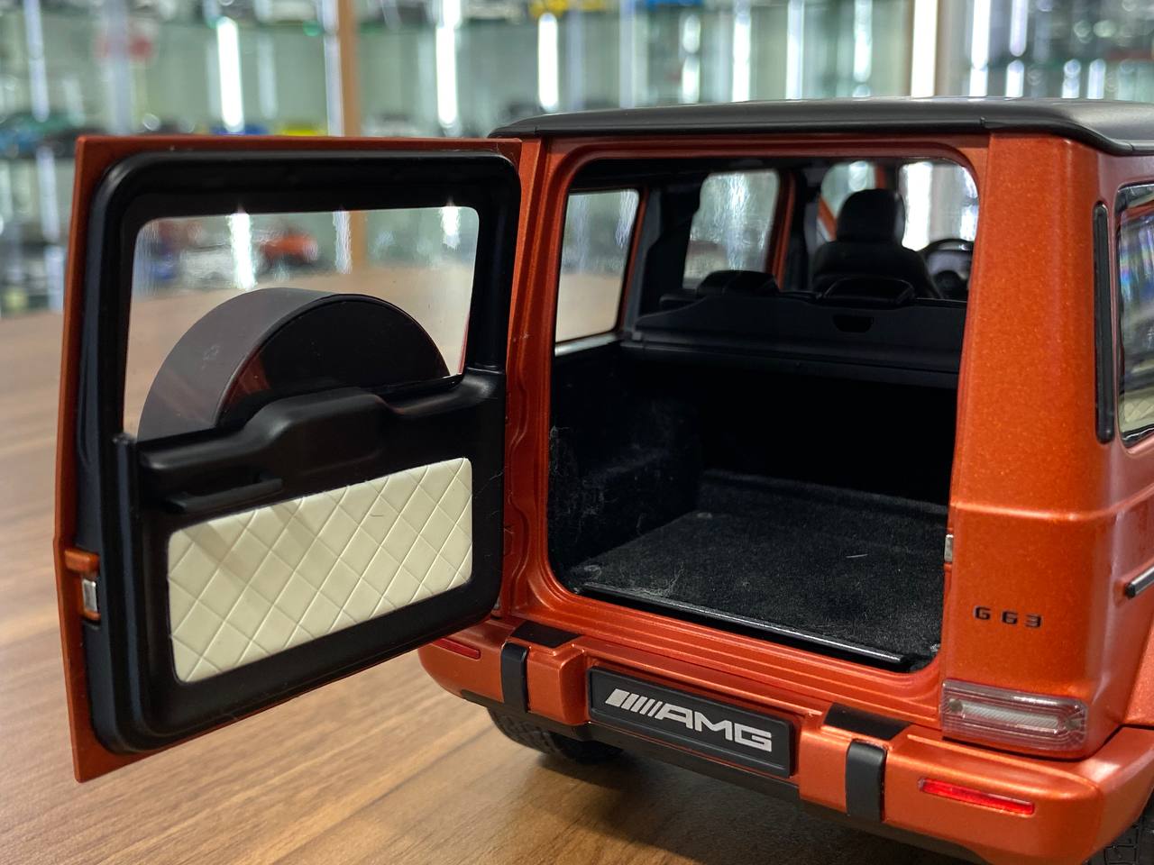 1/18 Diecast  – Mercedes-Benz G 63 AMG Model | Minichamps Dealer Edition | Full Opening | Copper Orange Magno