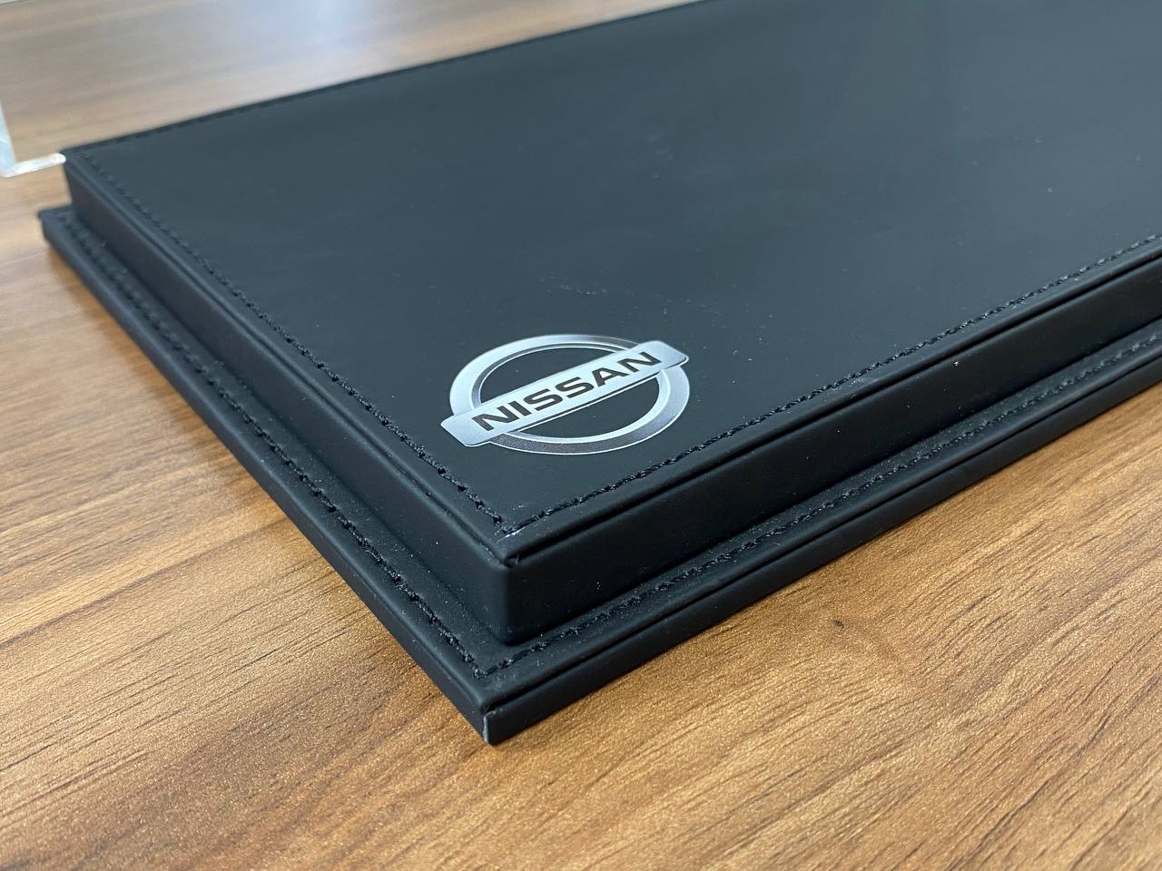 1:18 Acrylic Display Case – Black Leather Base with Nissan Logo Print
