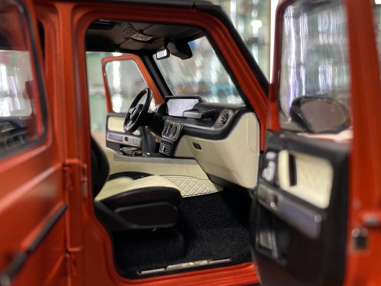 1/18 Diecast  – Mercedes-Benz G 63 AMG Model | Minichamps Dealer Edition | Full Opening | Copper Orange Magno
