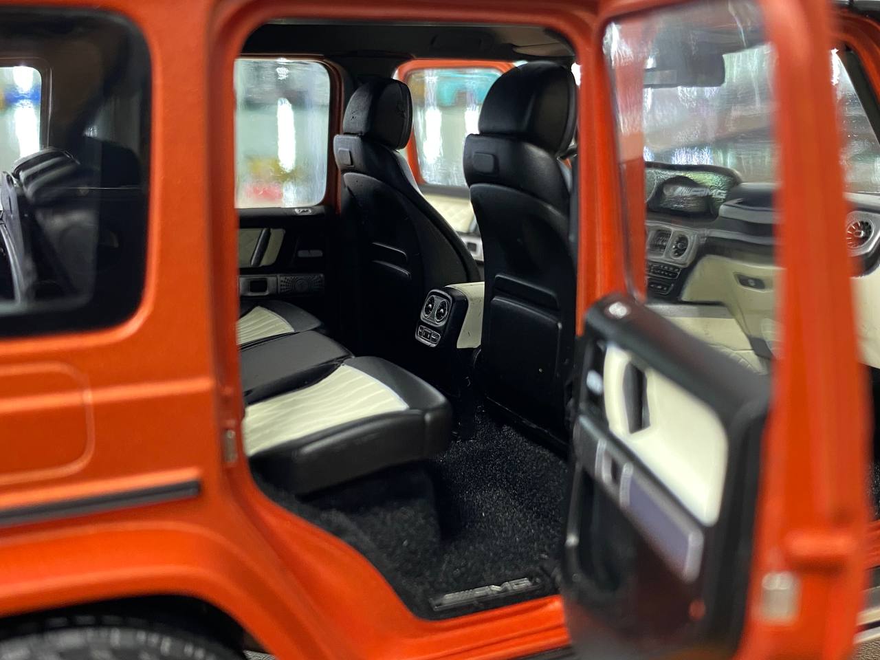 1/18 Diecast  – Mercedes-Benz G 63 AMG Model | Minichamps Dealer Edition | Full Opening | Copper Orange Magno