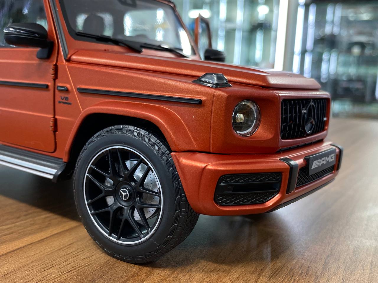 1/18 Diecast  – Mercedes-Benz G 63 AMG Model | Minichamps Dealer Edition | Full Opening | Copper Orange Magno