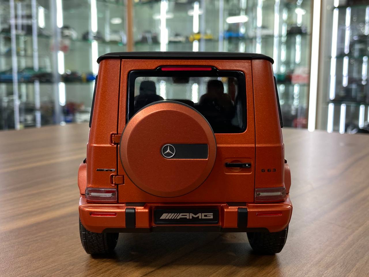 1/18 Diecast  – Mercedes-Benz G 63 AMG Model | Minichamps Dealer Edition | Full Opening | Copper Orange Magno