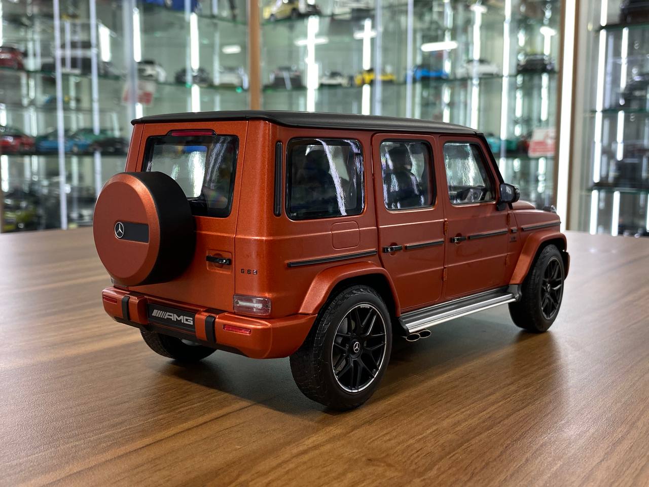 1/18 Diecast  – Mercedes-Benz G 63 AMG Model | Minichamps Dealer Edition | Full Opening | Copper Orange Magno