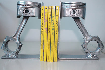 Piston book holder