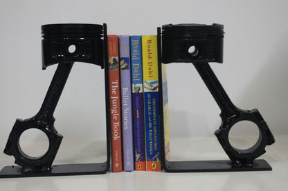 Piston book holder