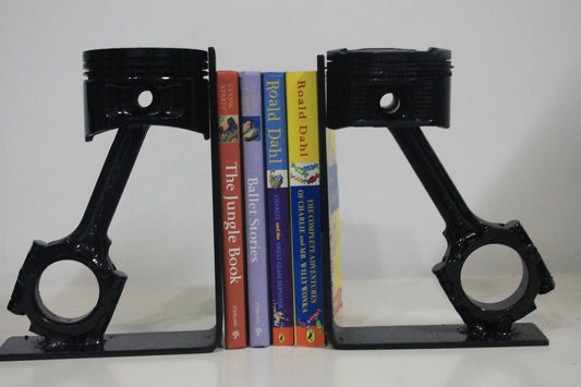 Piston book holder