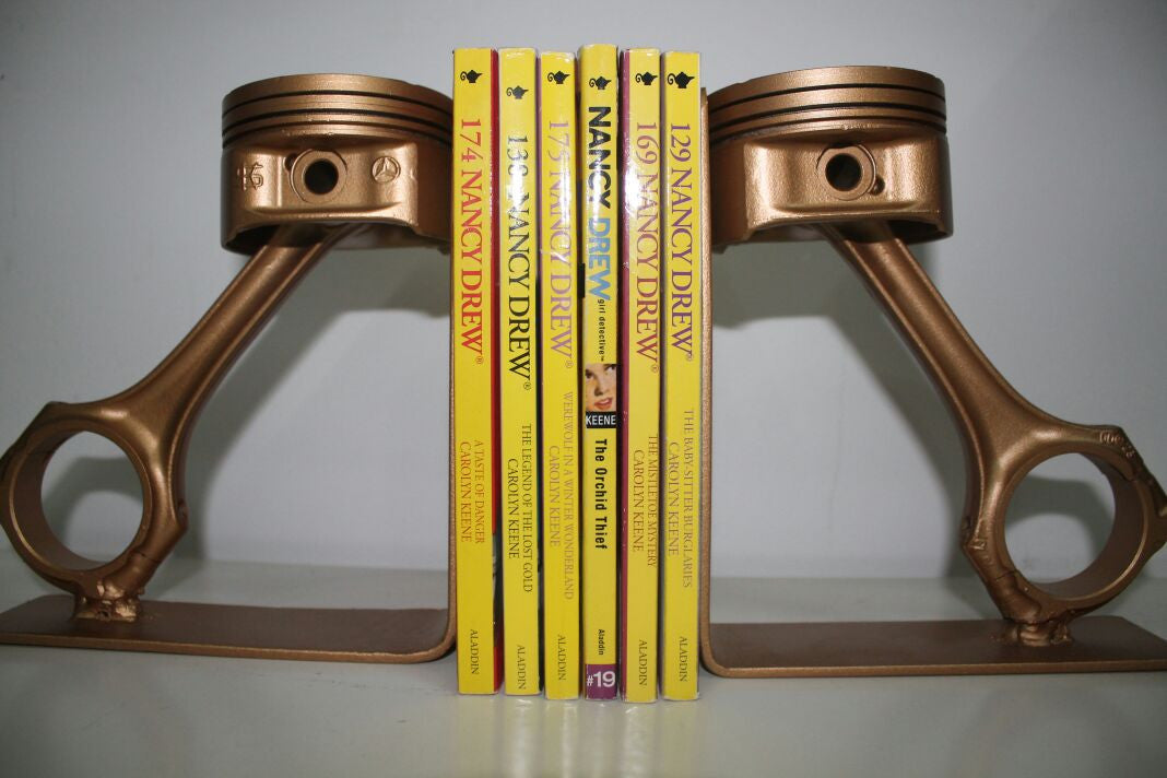 Piston book holder