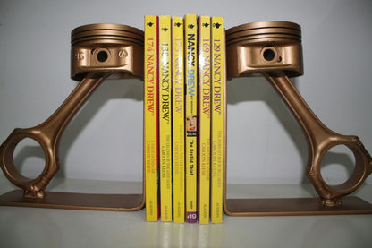 Piston book holder